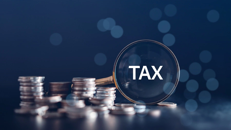 Person reviewing bank interest statement against tax allowance